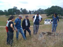 Dennis and University of Michigan folks looks at rocks at Vaira