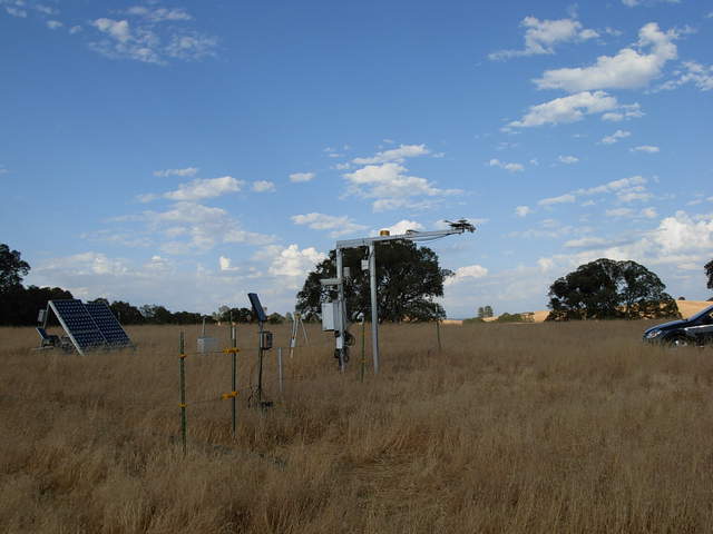 Cloudy sky. LED and PAR sensors mounted on a tower