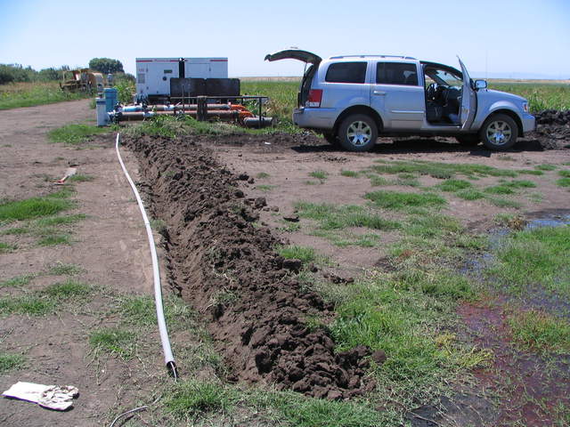 Trench for power line at rice field