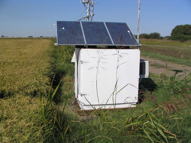 Equipment box and solar panels at the rice site