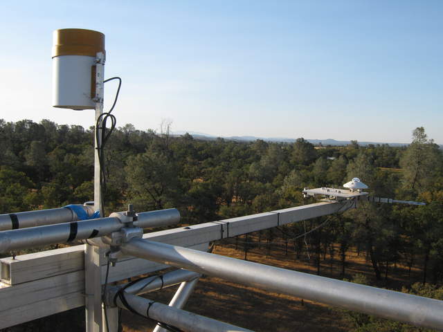 Tipping rain bucket and radiometers on Tonzi Tower