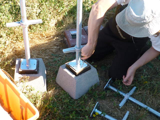 Joe working on feet of scaffolding.