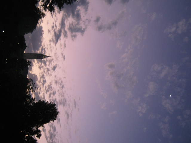 Campanile at dawn with cresent moon