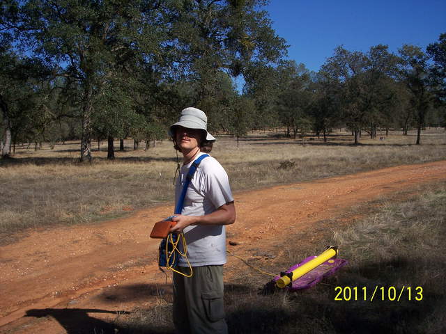 Joe pulling soil moisture sensor on sled at oak woodland