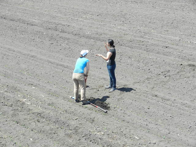 Sara and Carina taking soil samples
