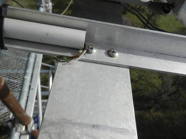 Frayed net radiometer wire at tower top