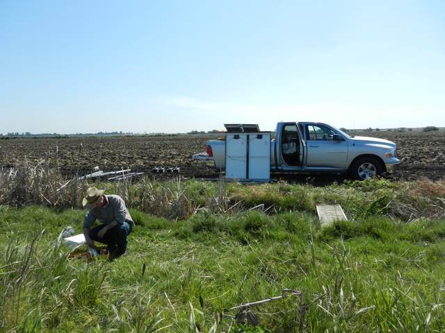 Cove packing up the pieces after taking down the DWR Corn tower