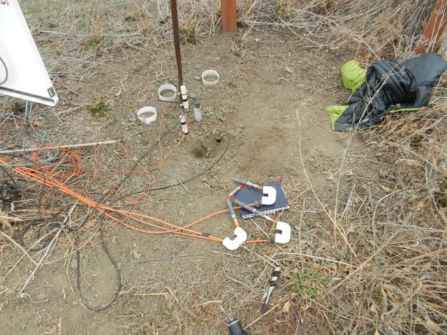 Installing soil CO2 sensors at the cow pasture