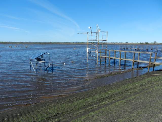 Separate scaffolding set up in the channel for the solar panels and batteries