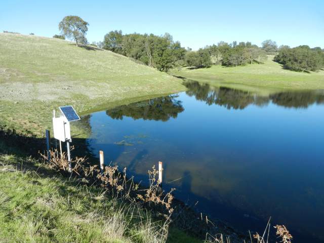 Installed water pressure sensor at large pond northeast of our tower site. The Vairas need to report their water diversions to the state