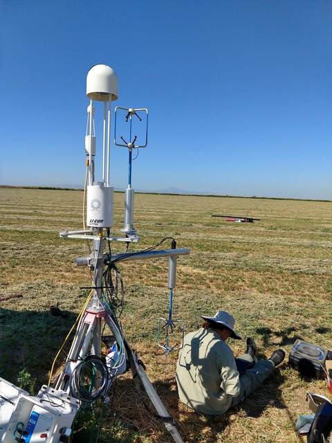 Joe sitting next to the secondary tower for CH4 release experiement