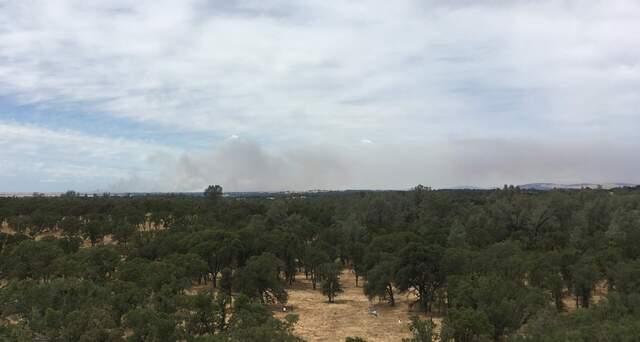 Fire to the northeast on a blustery day