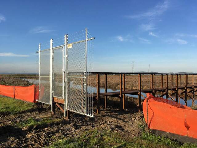 New gate at beginning of boardwalk - nice looking but not so useful.
