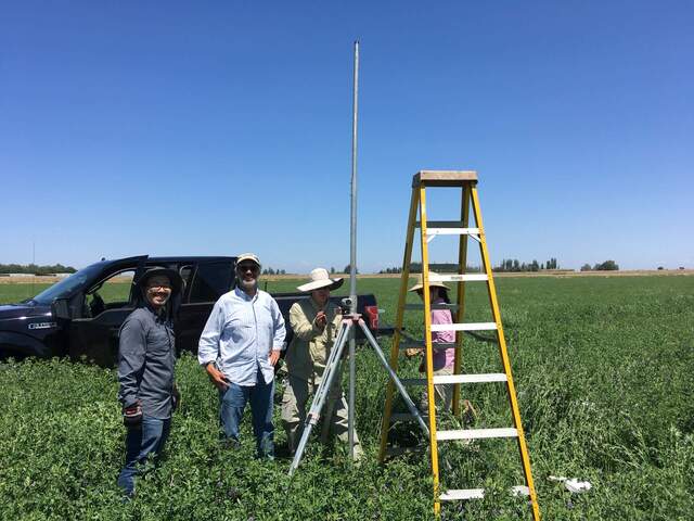 Carlos, Dennis, Joe and Daphne installing the bouncer tower for the