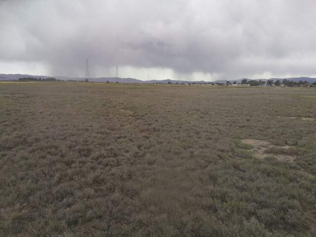 Stormy sky and rain on the horizon