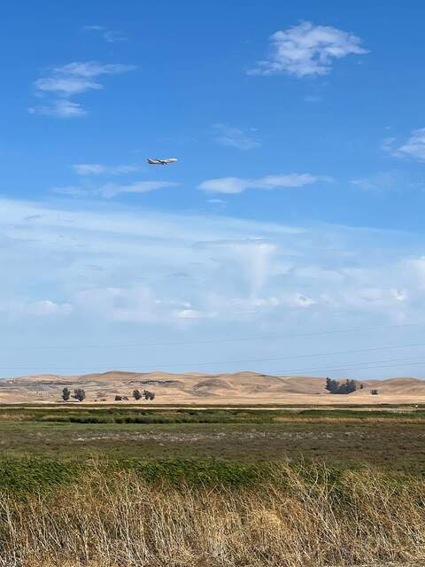 What looks like a commercial plan taking off from Travis AFB.