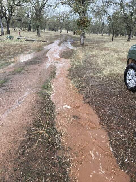 Thunderstorm turned the road into a stream and pond