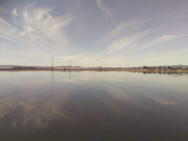 Clouds reflected in water
