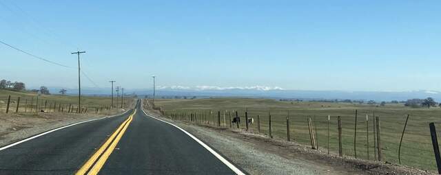 Snow in the Sierras on the way to Tonzi