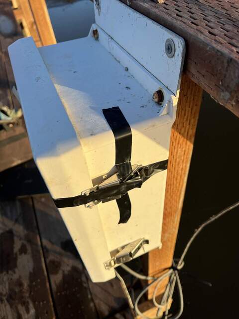 Taped clasp to enclosure after it came off of enclosure holding CR23X and EXO adapter