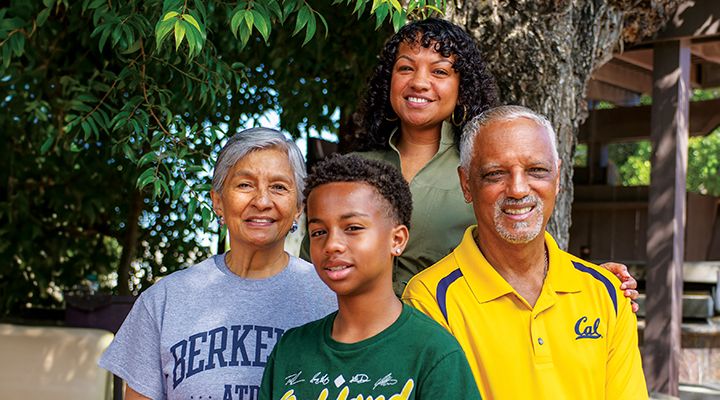 A family smiling at the camera