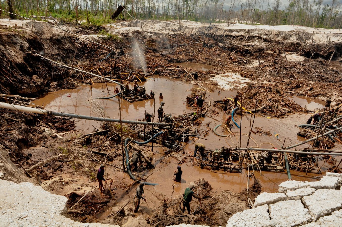Miners in a gold mine in Indonesia